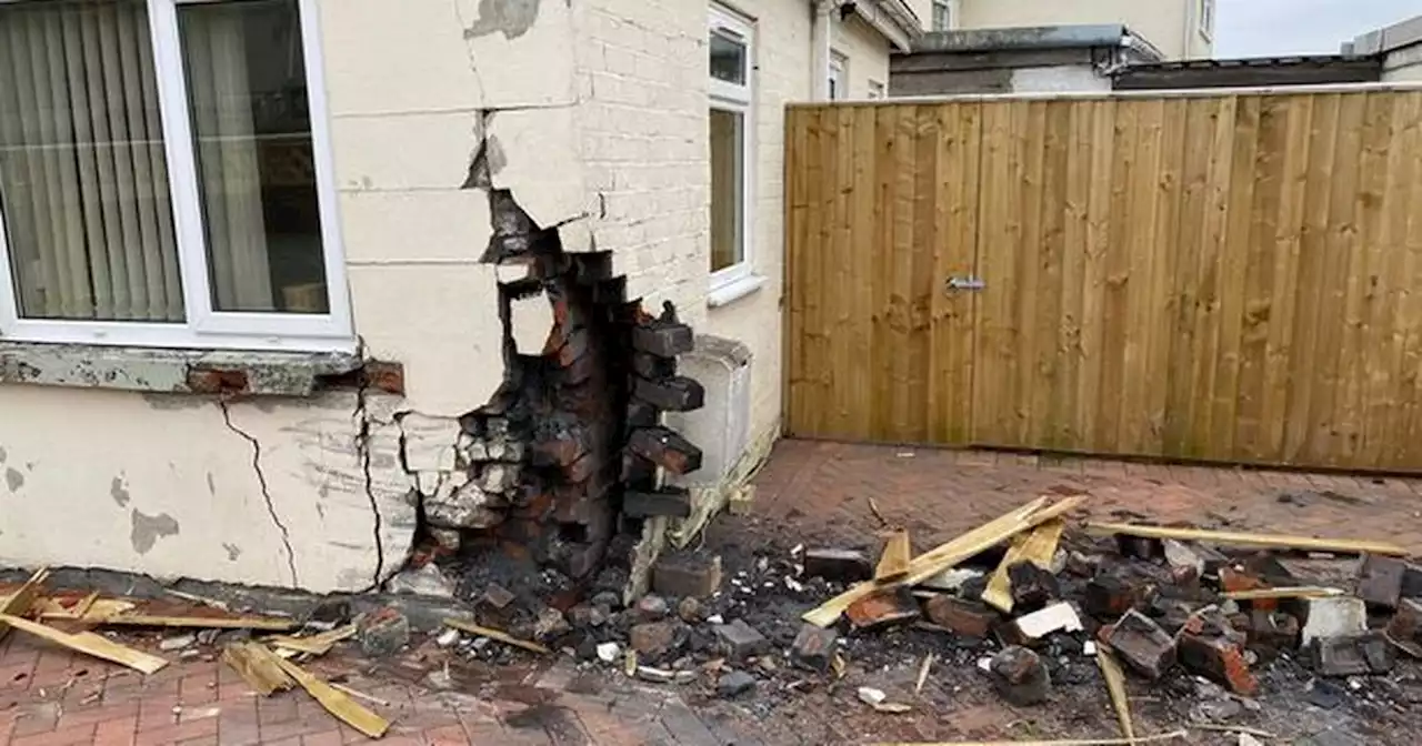 Shocking moment Jaguar driver accelerated into house before fleeing the scene