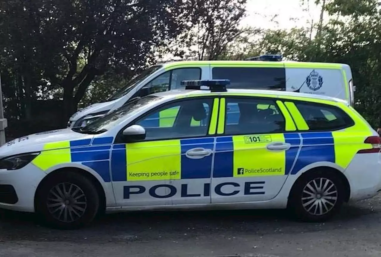 Two youths charged after being spotted 'damaging a car' on Glasgow street