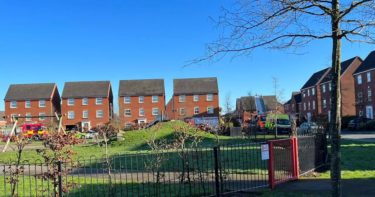 'Police incident' sees quiet street flooded with emergency services - live