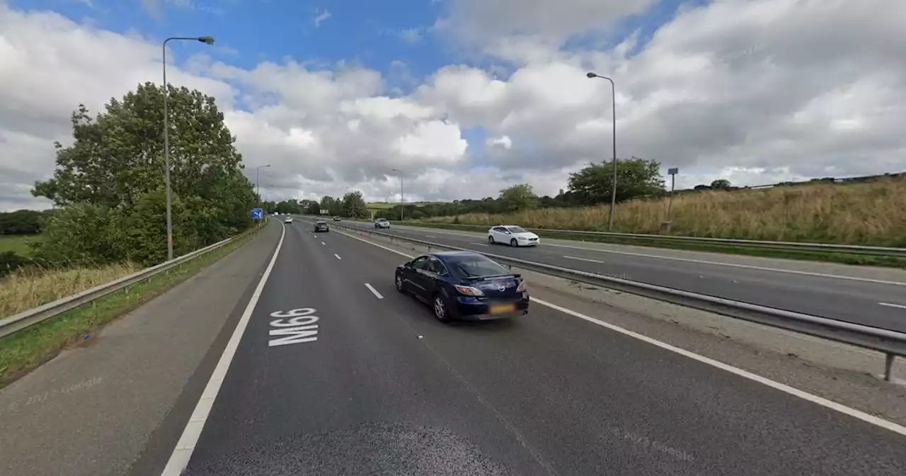 Woman suffers head injury after car hits road sign on M66 motorway