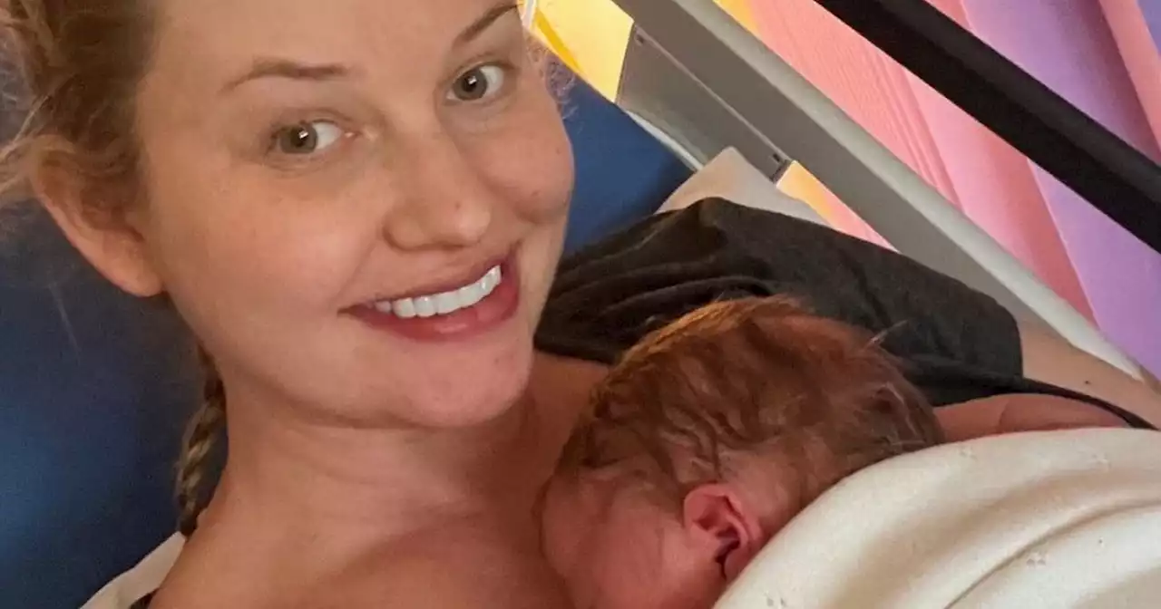 Shaughna Phillips and Olivia Attwood congratulate Amy Hart as she gives birth