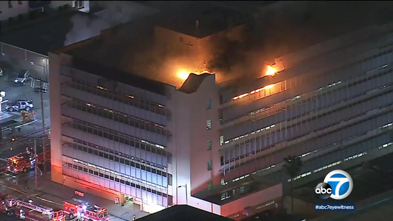 Large fire at LA County social services building engulfs top floor, making work for crews difficult