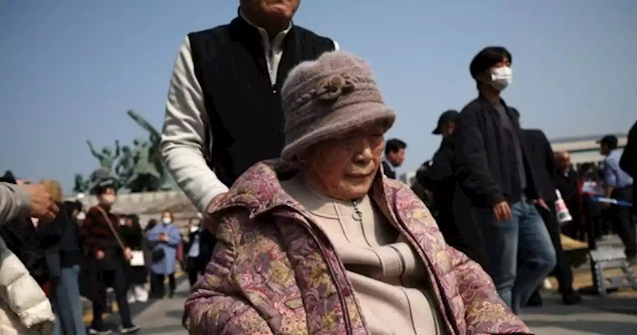 Forced labour victims protest in wheelchairs, reject South Korea deal on Japan