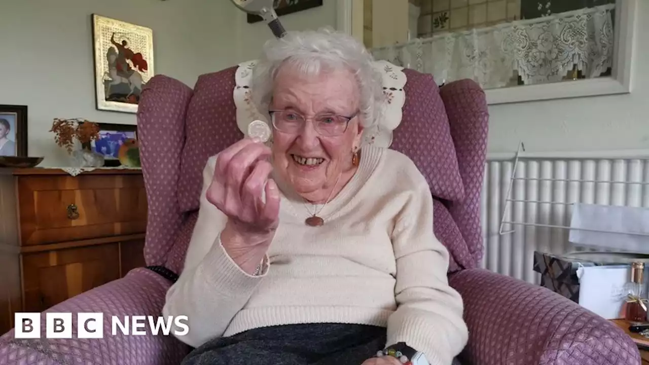 Woman, 101, surprised with King Charles coins