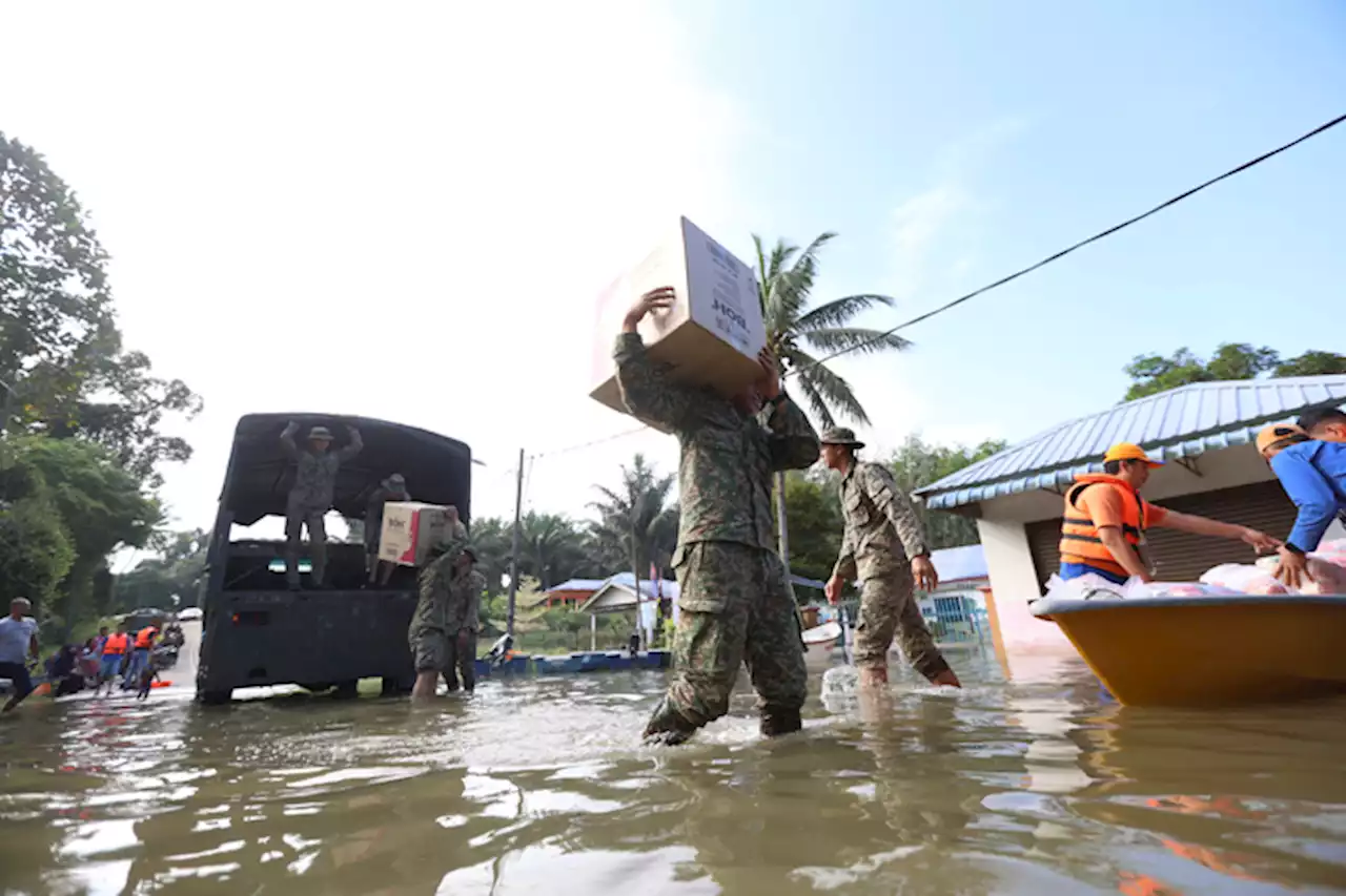 Fifth body found in Malaysia floods; over 40,000 displaced | Associated Press