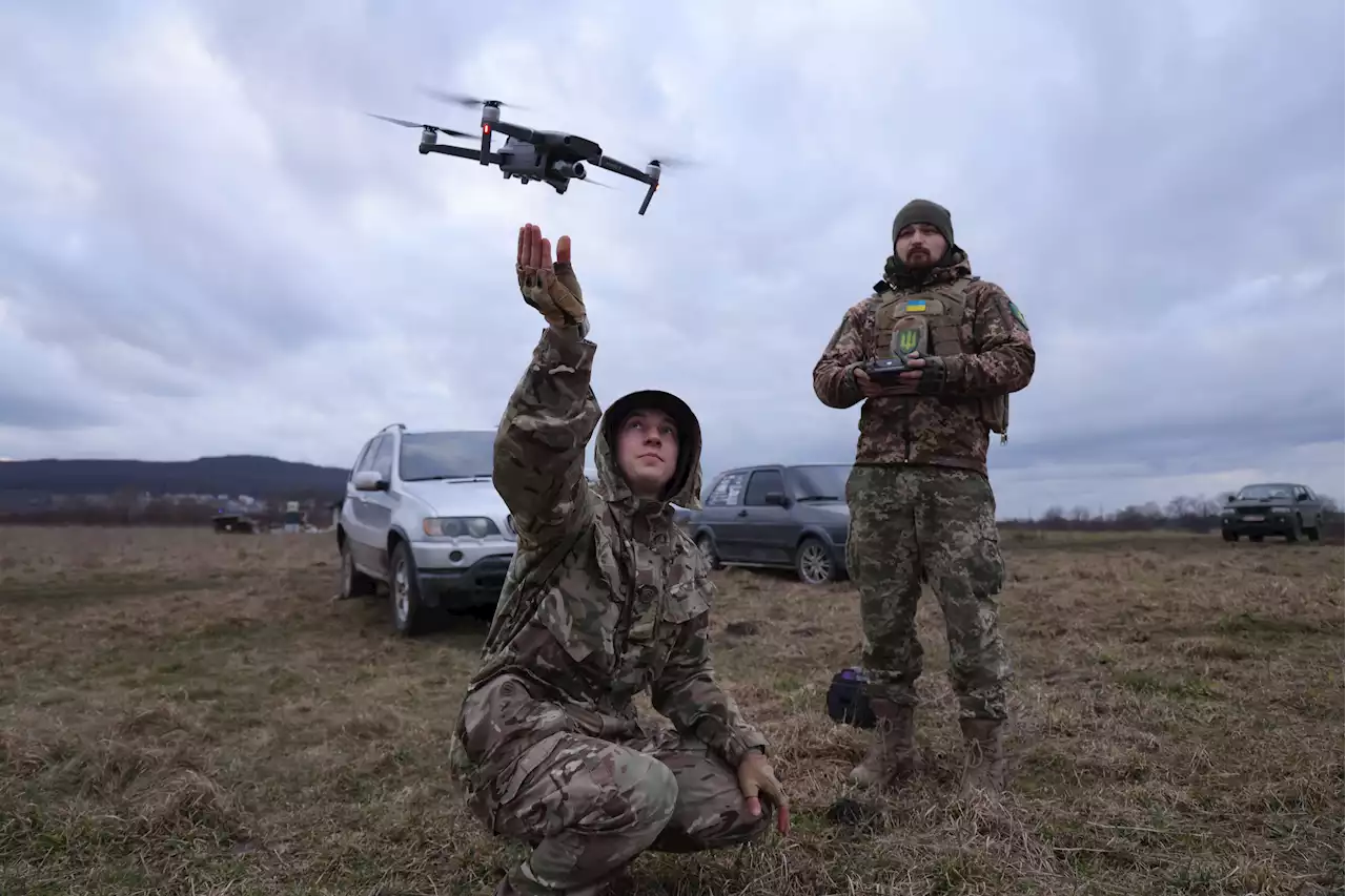 Video shows Ukraine drone drop grenades on unsuspecting Russians