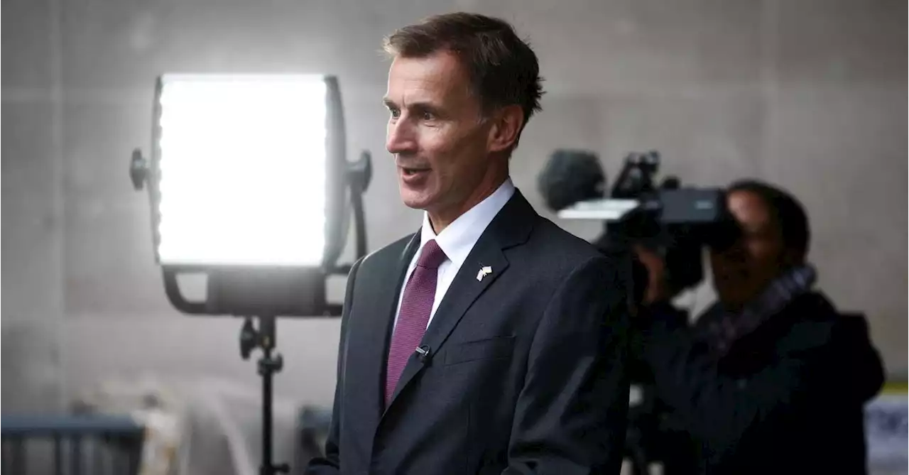 Britain's Hunt to keep tight budget with eye on 2024 election