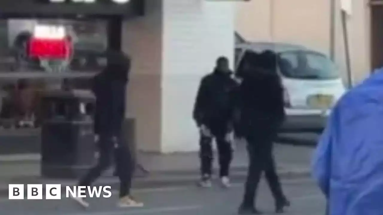 Machete fight outside Leeds KFC caught on camera