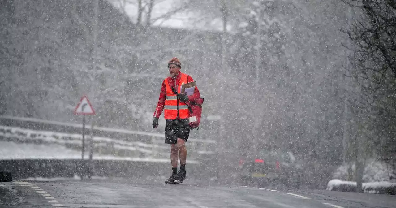 Major roads CLOSED as heavy snow brings disruption to areas near Manchester