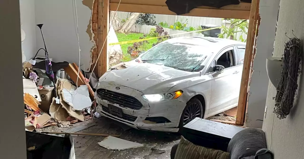 San Diego family displaced after car crashes into home, kills dog