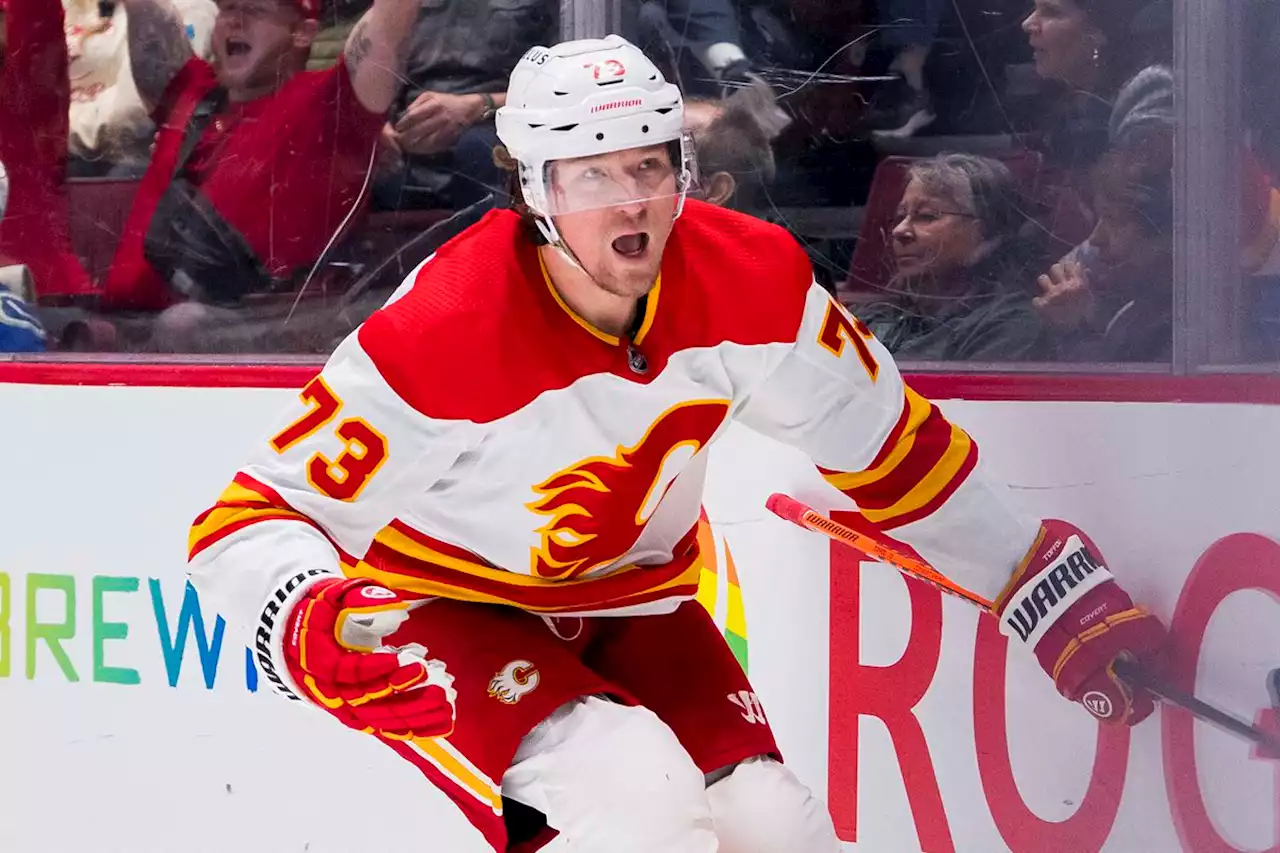 Toffoli scores twice, Flames complete comeback in 5-4 OT win against Canucks