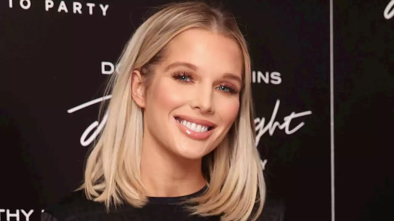 Helen Flanagan looks unbelievable as she poses in bikini top and denim mini skirt