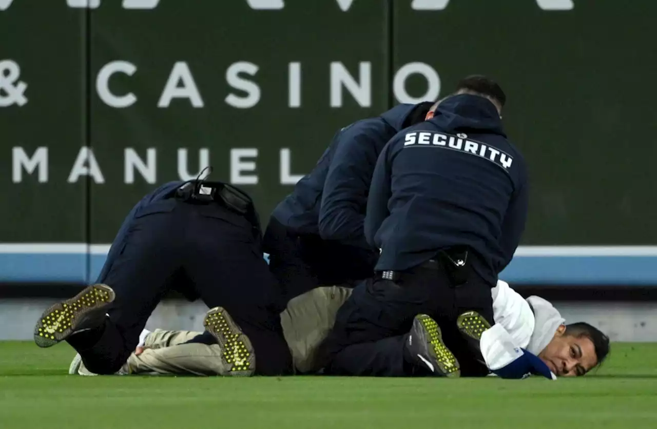 Tackle ends Dodger Stadium marriage proposal