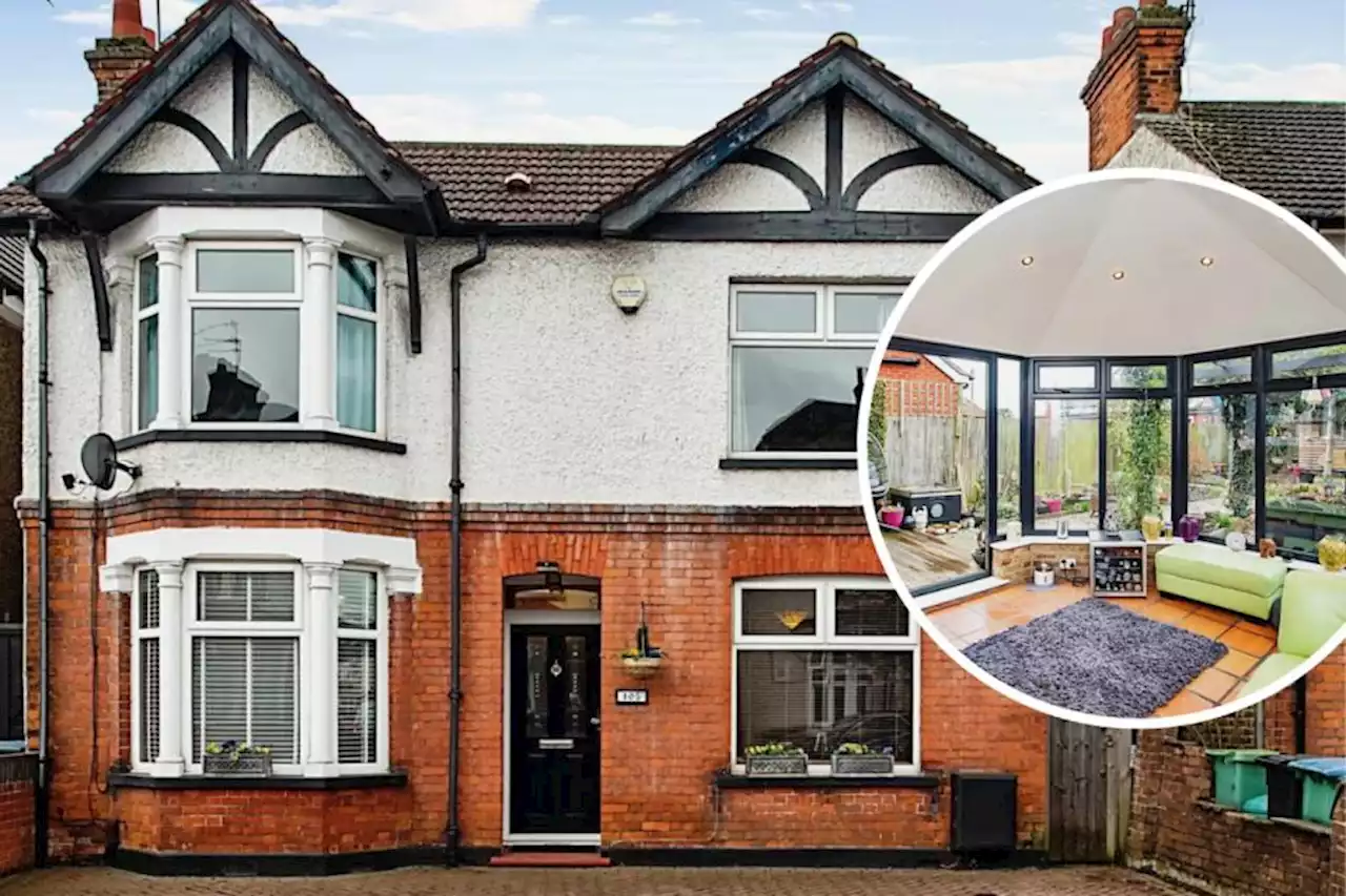 Inside this colourful detached home in Watford with a conservatory