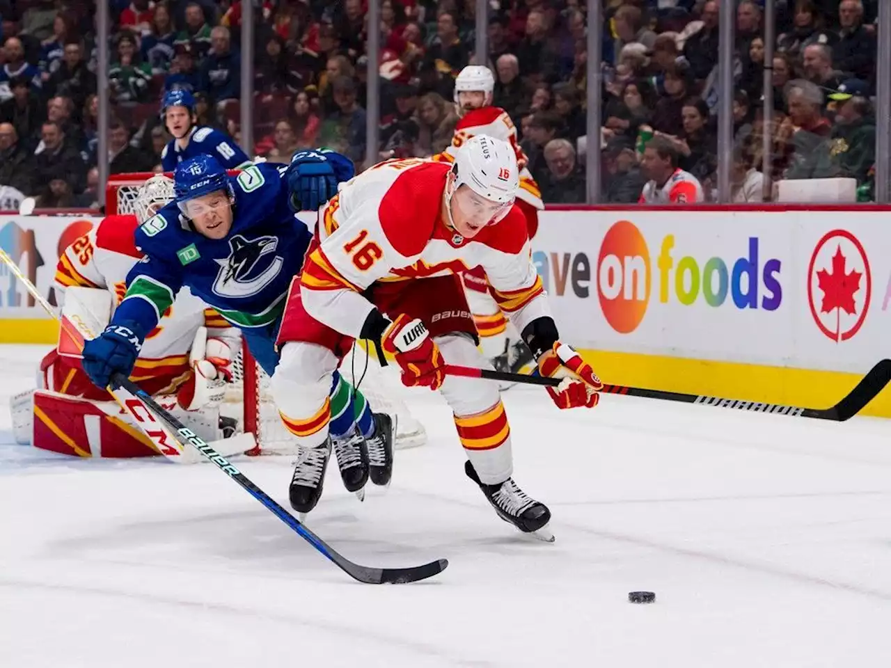 Flames 5, Canucks 4 (OT): Rookie Aidan McDonough's debut goal all for naught in loss