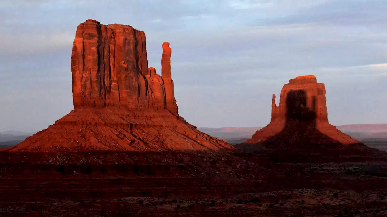 Towering Monument Valley buttes display sunset spectacle