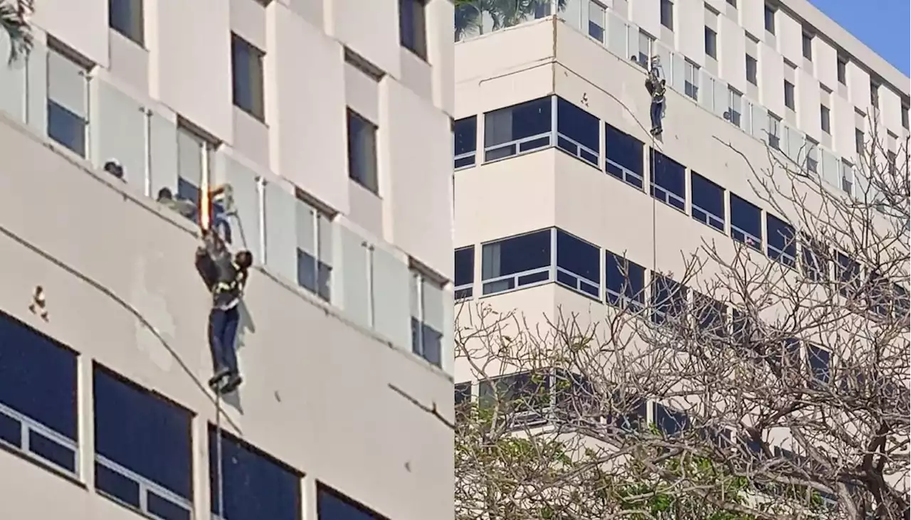 Obrero fue rescatado por bomberos tras quedar colgando en un hotel del norte