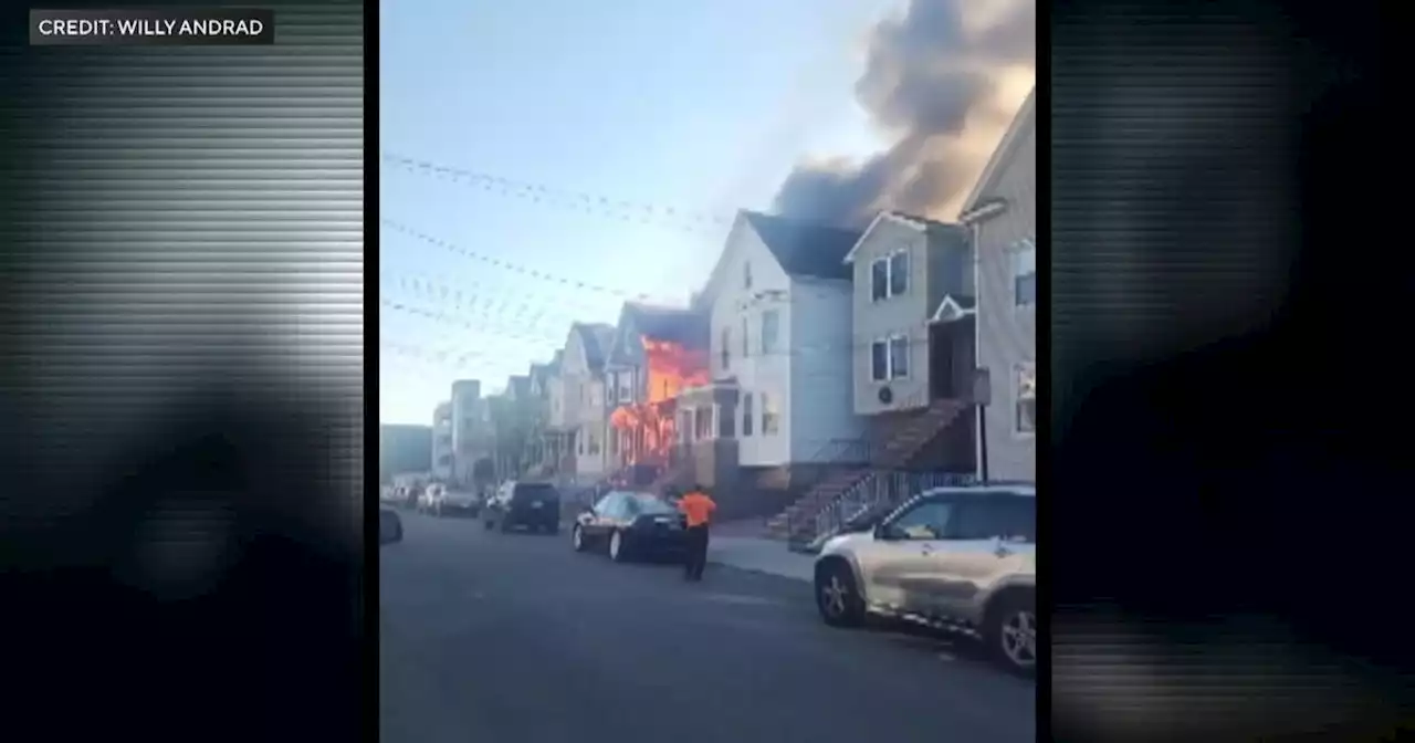 Firefighters spend hours battling blaze that burned 3 homes, caused 2 roof collapses in Elizabeth, N.J.