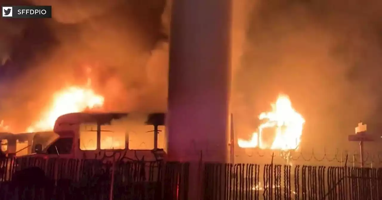 Late night fire engulfs 12 minibuses in flames under San Francisco freeway