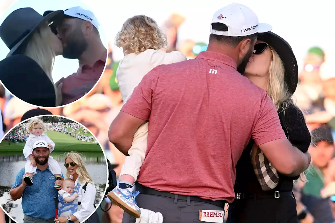 Jon Rahm kisses wife Kelley Cahill after winning his first Masters