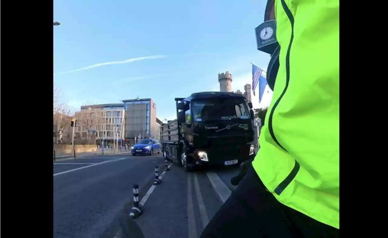 My Guinness! Truck driver smashes down cycle lane wands, cuts across and parks on the pavement