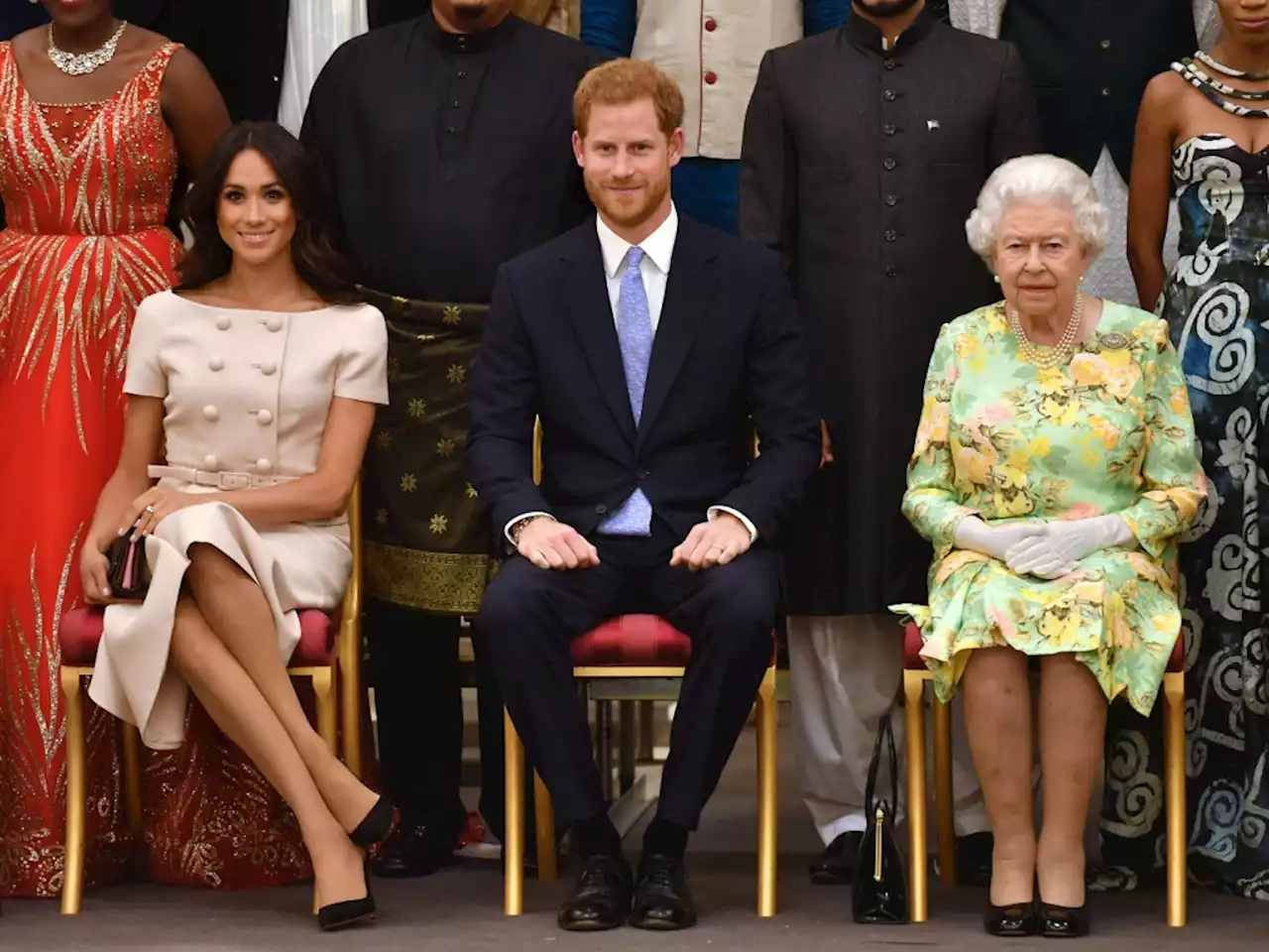 Queen Elizabeth Reportedly Thought This Particular Behavior From Meghan Markle & Prince Harry Was 'Quite Mad'