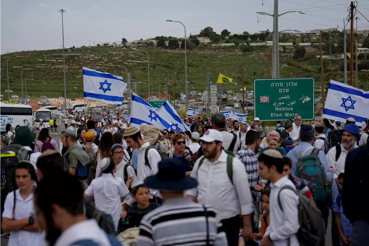 Israeli Settlers March in West Bank, Palestinian Teen Killed by Israeli Army