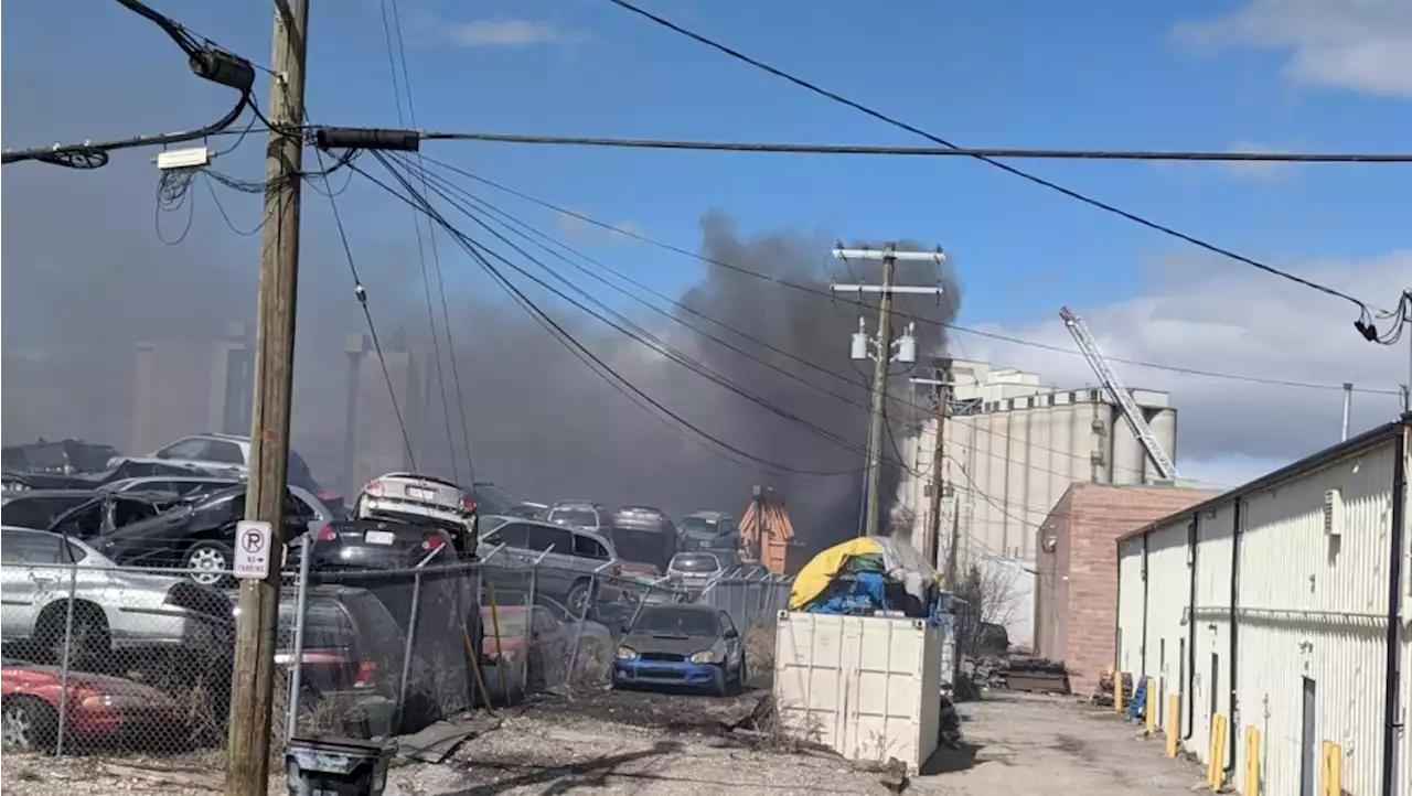 Plumes of black smoke visible throughout Calgary amid blaze at auto recycling facility