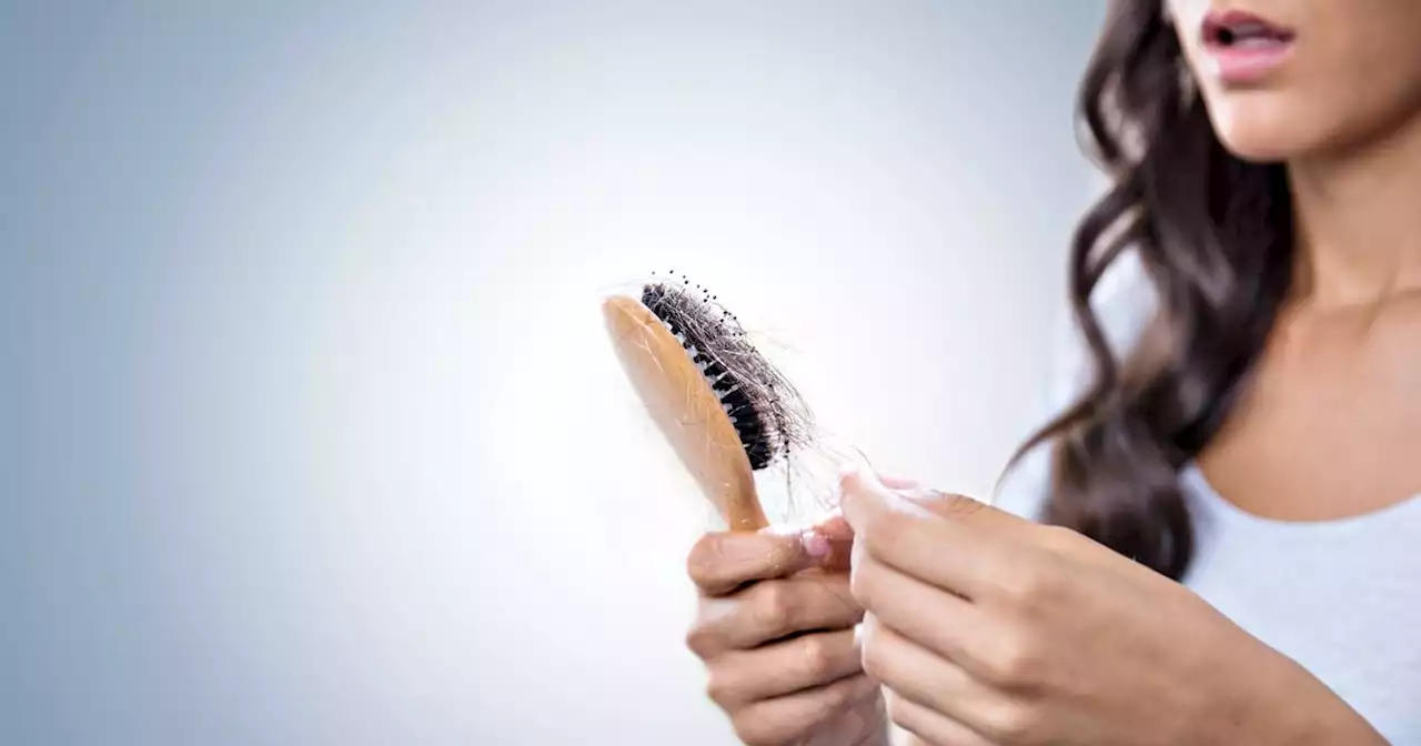 Woman explains what white 'fuzzies' on your hairbrush actually is