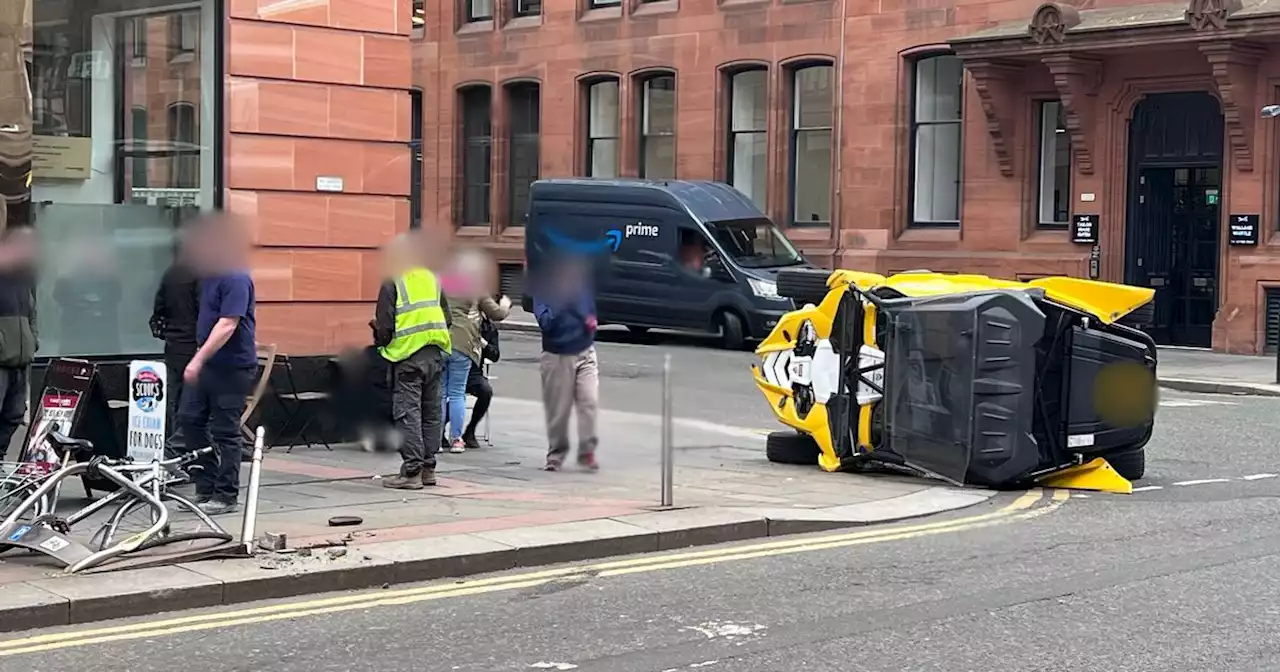 Off-road buggy overturns on busy Glasgow street after smashing into bike railing