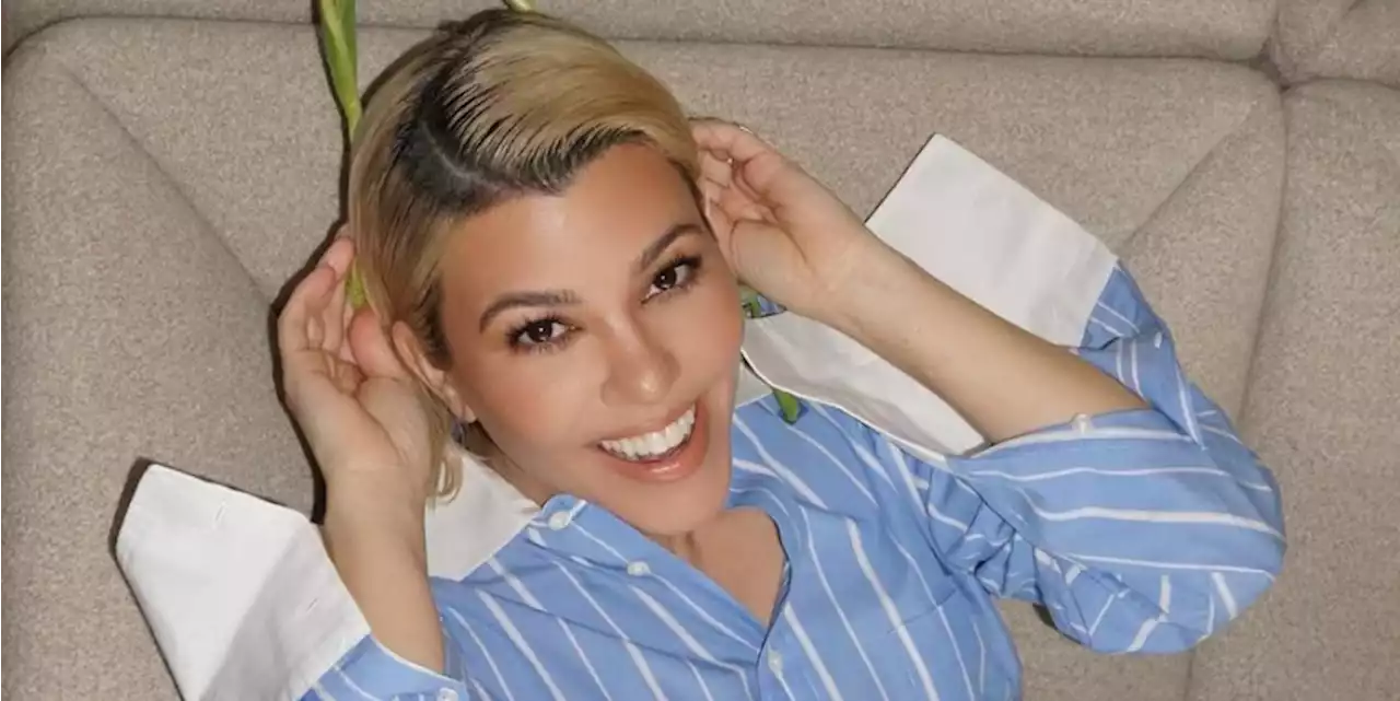 Kourtney Kardashian Poses in a Striped Shirt—and No Pants