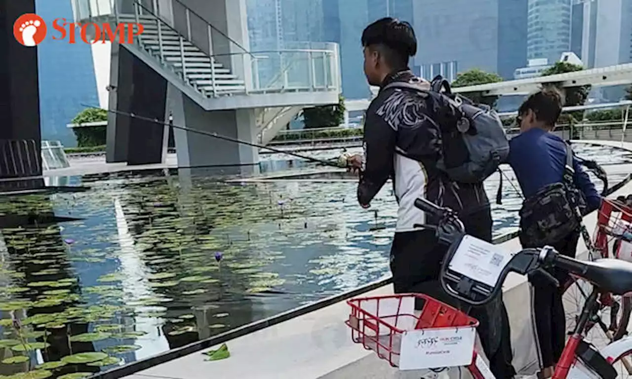 Youths chased away from fishing at MBS by security guard -- but not without their catch