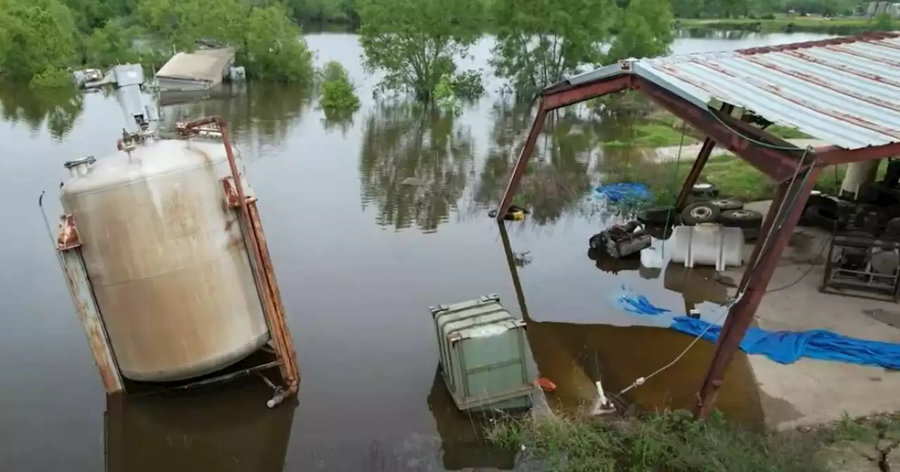 East Texas residents wait and watch as a sinkhole in their town grows