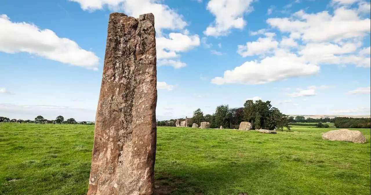 Oddly-shaped lanky stone sitting in a field has a sinister spellbinding past