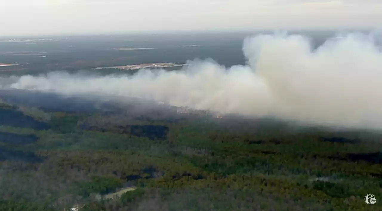 N.J. wildfire grows to more than 3,800 acres, but is 50% contained, officials say