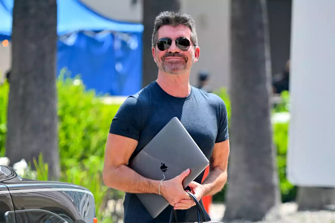 Simon Cowell looks slimmer than ever as he steps out in very baggy jeans in LA