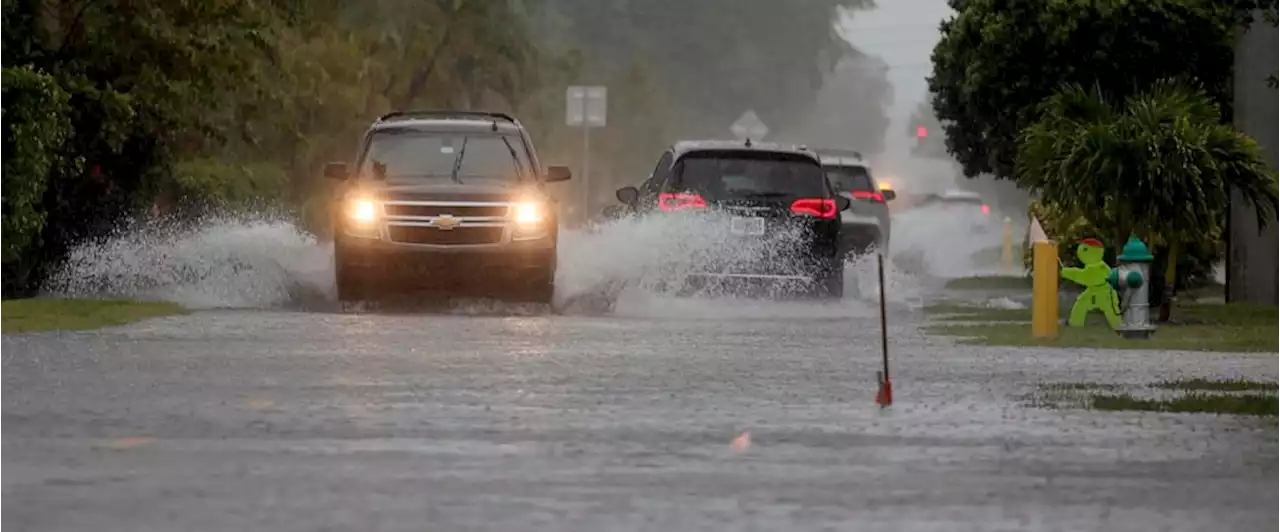 Torrential storms batter South Florida, close key airport