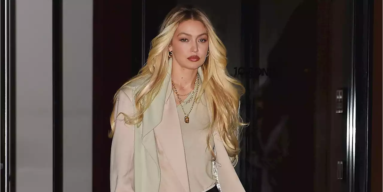 Gigi Hadid Does Easy Spring Dressing in a Beige Suit and Cozy Green Top