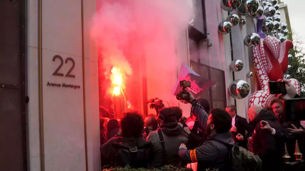 Railway workers invade Louis Vuitton HQ as protests erupt across France on eve of decision on retirement age