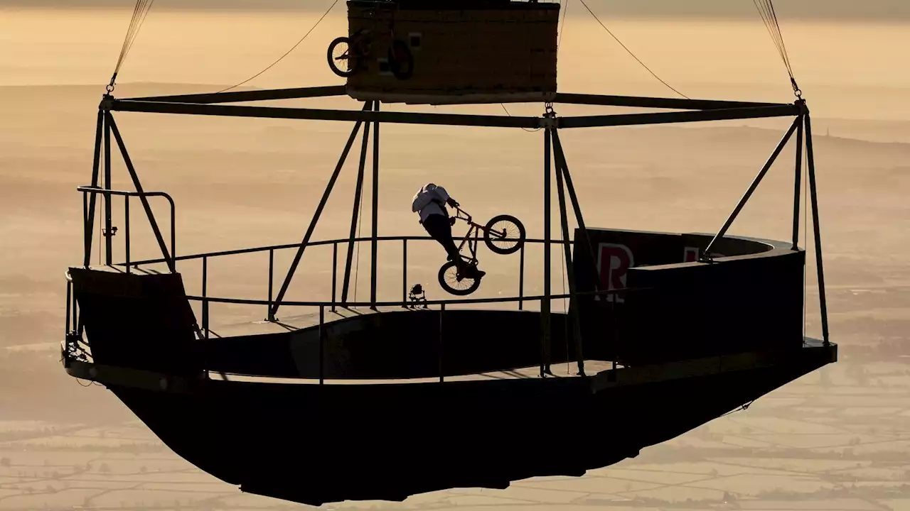 Red Bull BMX rider Kriss Kyle performs tricks on floating skatepark 2,000ft in the air