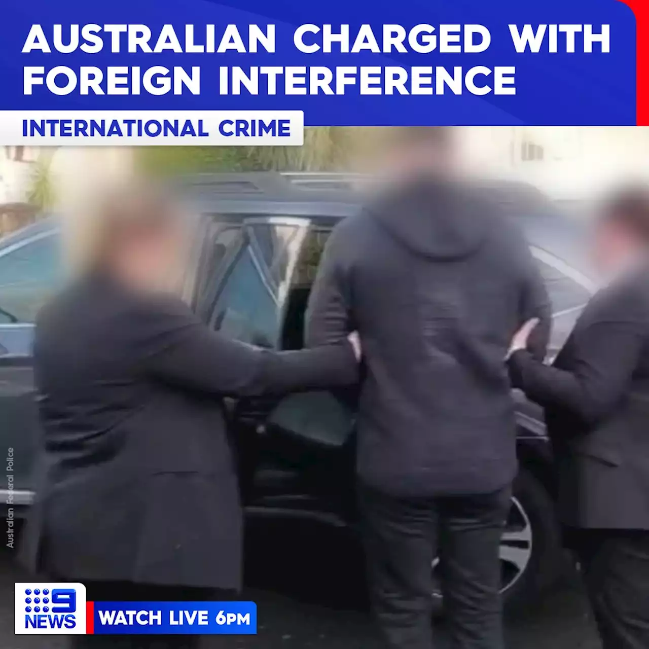 Australian man charged with foreign interference after allegedly compiling reports for pair of spies