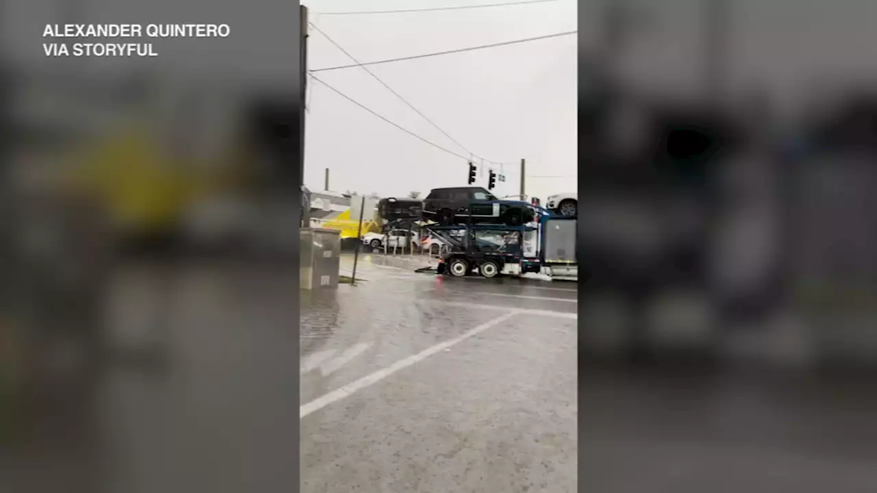 Passenger train slams into car hauler stuck on Florida railroad tracks, witness captures video