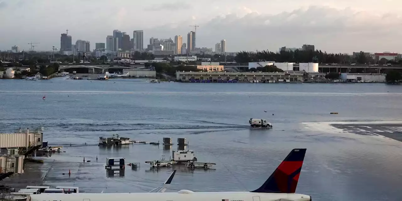 South Floridians mop up, recall fear after historic deluge