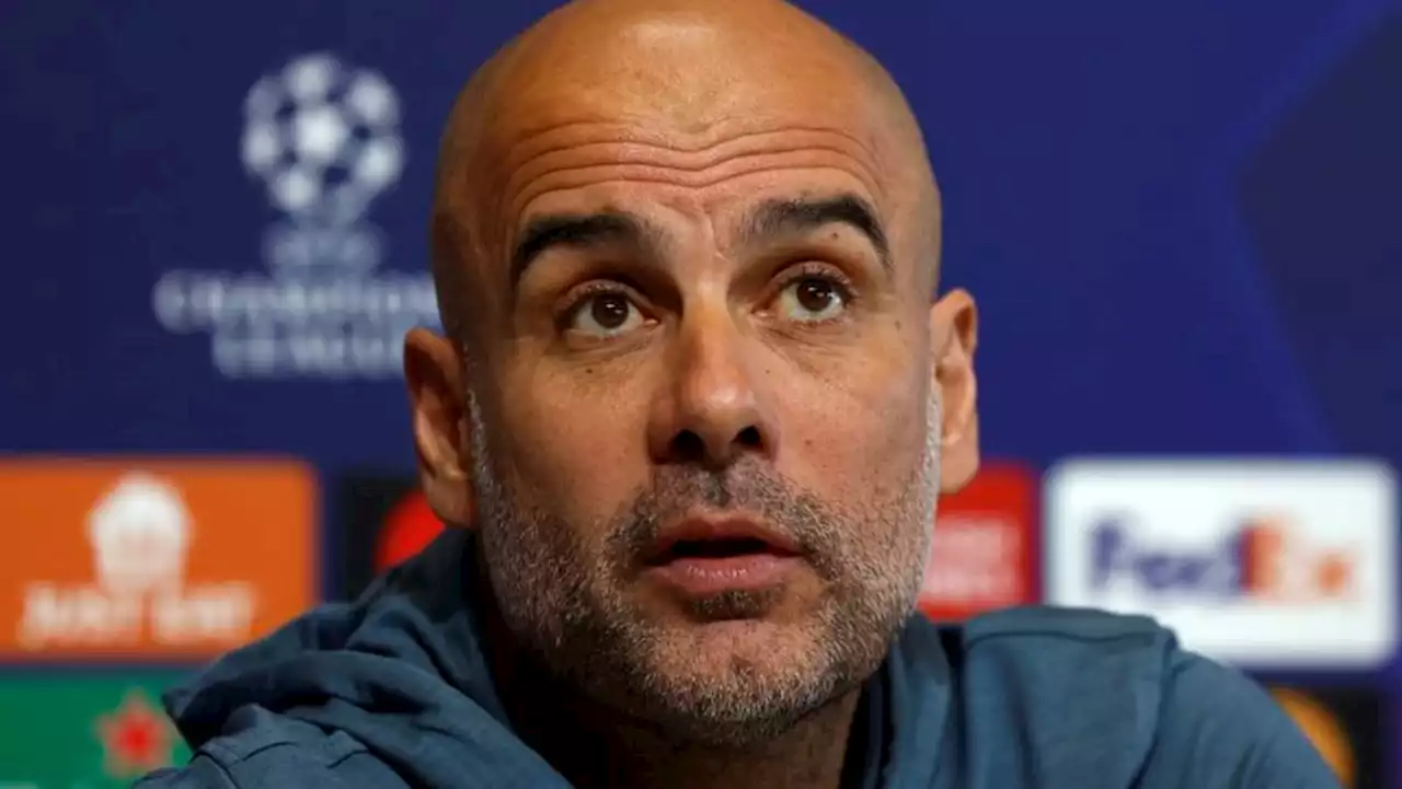 Guardiola says busy schedule can be a benefit in title race