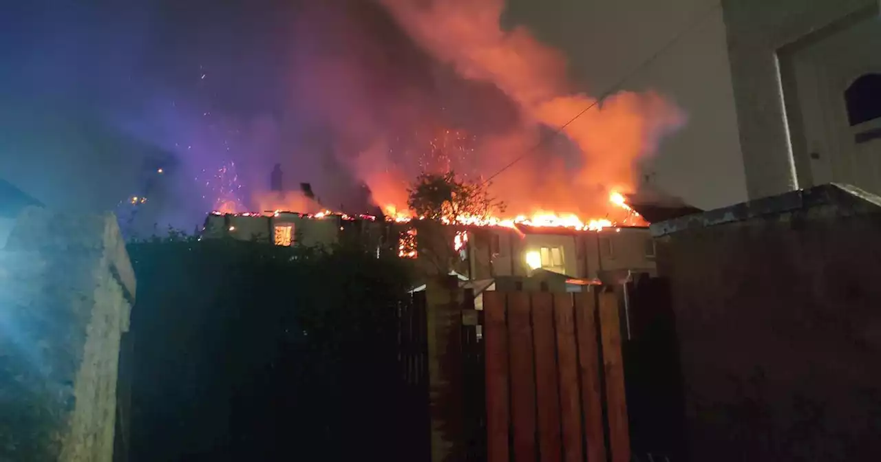 Huge blaze rips through block of Paisley flats as crews battle inferno overnight