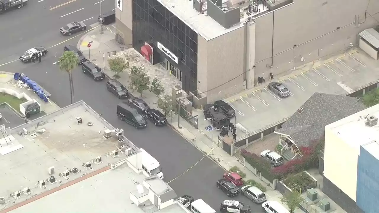 LAPD standoff underway involving armed suspect at bank in Koreatown