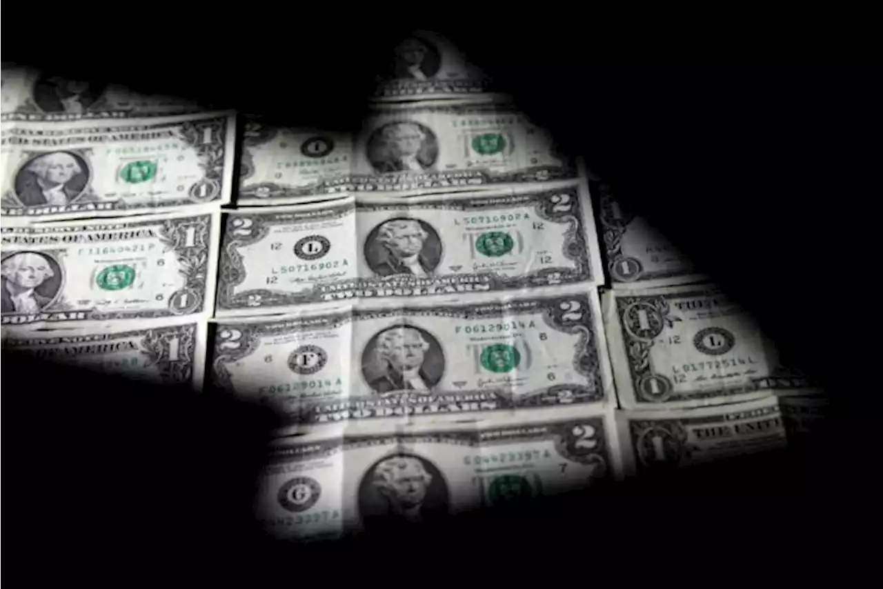 Dollar slides to one-year low as cooling inflation raises Fed pause expectation