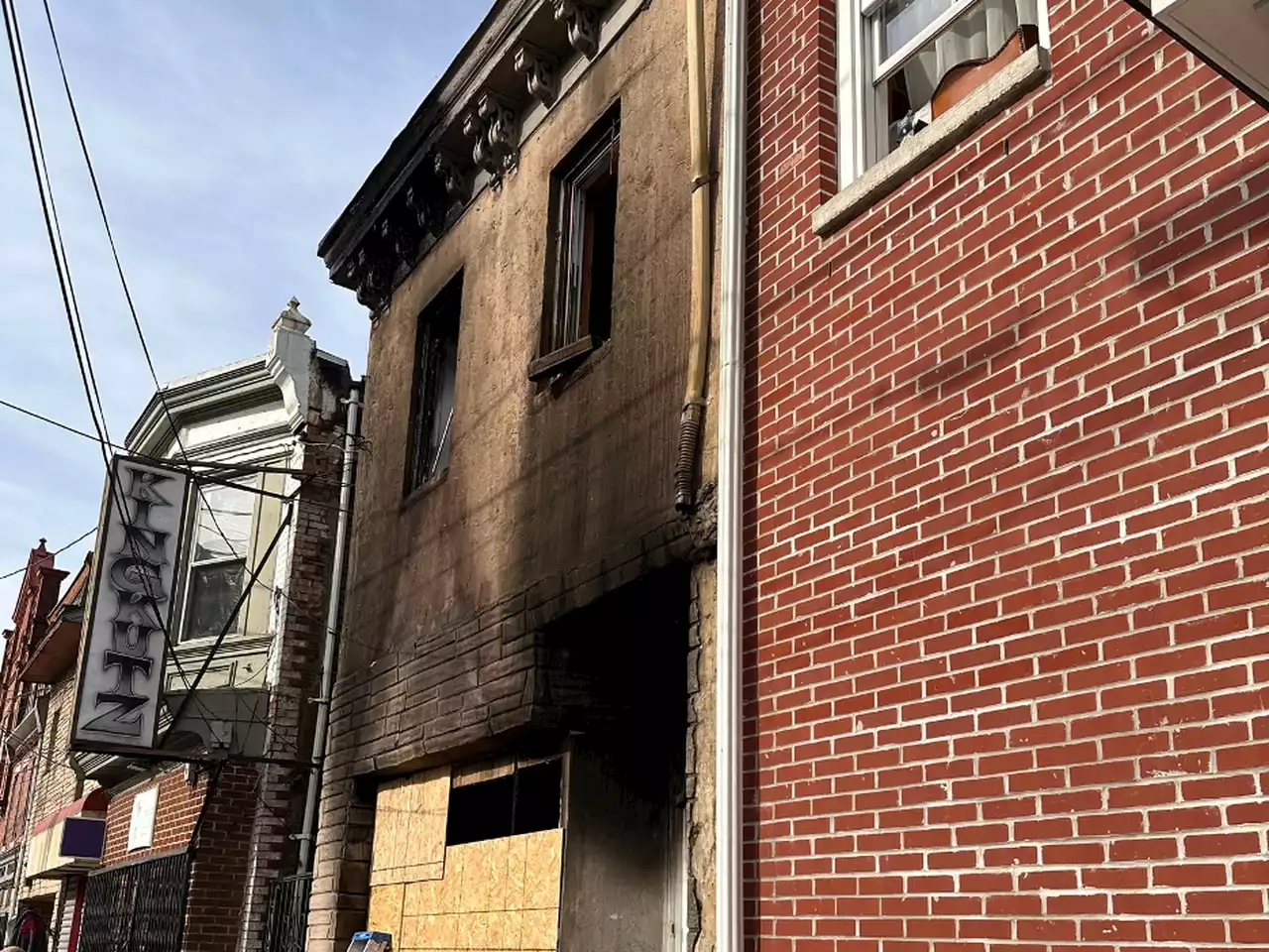 Camden home catches fire, damages next door community center