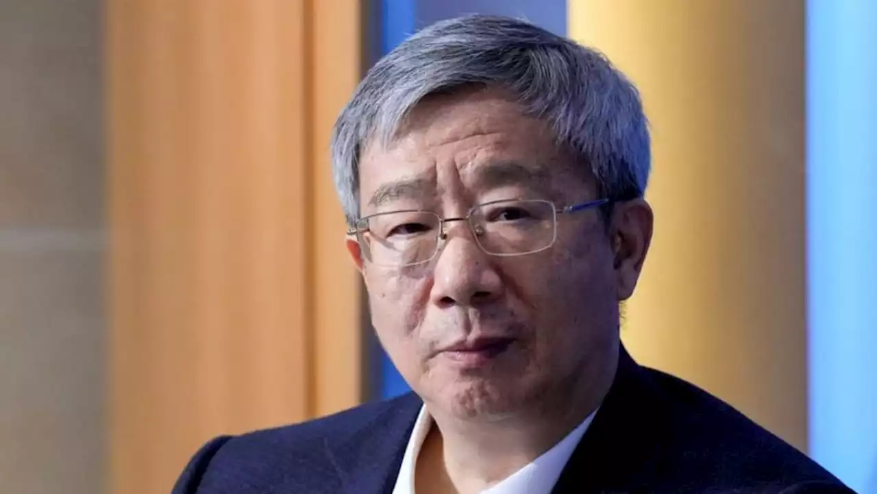 China's central bank chief signals phasing out currency intervention