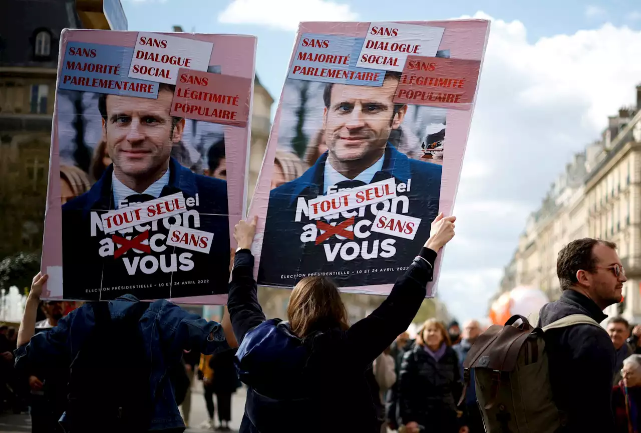 France's Macron signs contested pension law as unions plan more protests